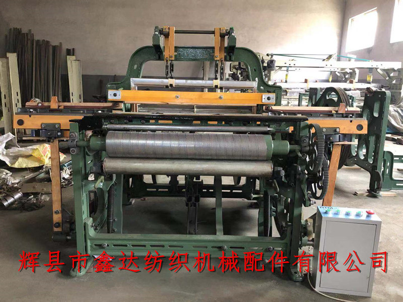 Small manual shuttle changing loom